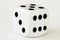 One dice on white background - close up macro stock photography