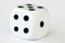 One dice on white background - close up macro stock photography
