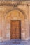 One of doors of Carlos V palace at Alhambra in Granada, Spa