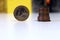 One euro coin and stack of cents on blurred background