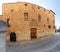 One of the facades of the Casa de las Conchas building in Salamanca (Spain