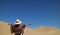 One female enjoy the awesome view of Huacachina desert in Ica region of Peru