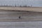 One fishman working on the black beach