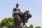 One of four bronze statues around the Queen Victoria Memorial, London, United Kingdom