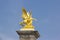 One of four gilt-bronze statues of Fame The Pont Alexandre III bridge Paris