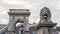 One of four lion sculptures by Janos Marshako, at ends of the Chain Bridge, Budapest, Hungary