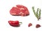 One fresh rib eye steak and and rosemary, red chillypepper and cloves of garlic on white background,
