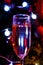 One glass of champagne against the background of blue blurred lights. Happy Valentine`s Day Valentine`s Day Christmas
