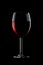 One glassed of red wine isolated on black background