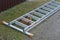 One gray aluminum ladder stepladder