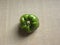 One Green color whole Bell pepper