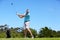 One heck of a drive. Full length shot of a mature golfer finishing his swing.