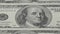 One hundred dollar bills close-up - 2. Macro photography of banknotes. Portrait of Benjamin Franklin.