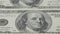 One hundred dollar bills close-up. Macro photography of banknotes. Portrait of Benjamin Franklin.