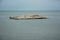 One large lone Iceberg floating in the Great Lakes