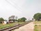 One lonely rail station of some rural India on a Sunny midday.