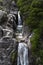 One man canyoning at the Arado Waterfall cascata do arado in the Peneda Geres National Park