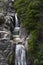 One man canyoning at the Arado Waterfall cascata do arado in the Peneda Geres National Park, in Portugal