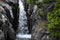 One man rappelling the Arado Waterfall cascata do arado in the Peneda Geres National Park