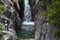 One man rappelling the Arado Waterfall cascata do arado in the Peneda Geres National Park