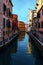 One of the many beautiful old Venetian canals on a Sunny summer day