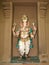 One of the many colorful sculptures with multiple arms and elephant head inside Sri Maha Mariamman Temple