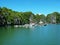 One of the many floating fishing villages among large rock mountains in Ha Long Bay. Vietnam