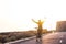 One mature and pensioner man enjoying his bicycle alone in the street with the sunset in the background - fitness and healthy