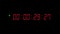 One minute of glowing led 29,97 fps timecode readout with red digits and green blinking dot on black background