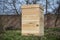 One new set of wooden beehive in the spring garden, closeup