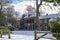 One of the old buildings in De Horsten park in Wassenaar, covered with a layer of snow