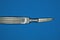 One old gray medical surgical scalpel