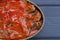 one open almina oval tin can with sardine fish in tomato sauce