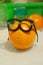 One orange with glasses, smart orange, organic food choise