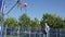 One Person Playing Basketball for Fun, a Recreational Sports Activity. Man Relaxing Playing Basketball in a Park.