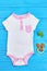 One-piece baby cotton bodysuit.