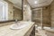 One-piece bathroom with white porcelain sink with mesh doors