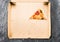 One piece of pizza in cardboard pizza box Top view of empty box with copy space on dark concrete