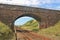 One rail railway and old railway bridge along the north-western coast of England.