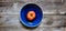 One rare heirloom beefsteak tomato isolated in beautiful blue dish