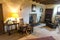 One of the rooms interior with an old baby cradle on a floor, Crathes Castle, Scotland