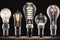 One row of the evolution of electric light bulbs glowing on a black background,Generative AI.