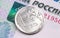One russian ruble coin on russian money, rubles closeup,
