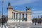 One of the semicircular colonnades in the Square of One of Heroes , Budapest