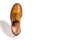 One Separate Male Tan Brogue Oxford Shoe. Isolated