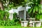 One set of white marble tables and chairs in the flower garden