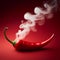 one single Chili pepper steaming hot smoke on red background