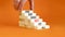 One size does not fit all symbol. Concept words One size does not fit all on wooden blocks. Businessman hand. Beautiful orange