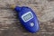 One small blue mobile plastic electronic pressure manometer
