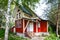 One-storey wooden summerhouse with attic in Russia